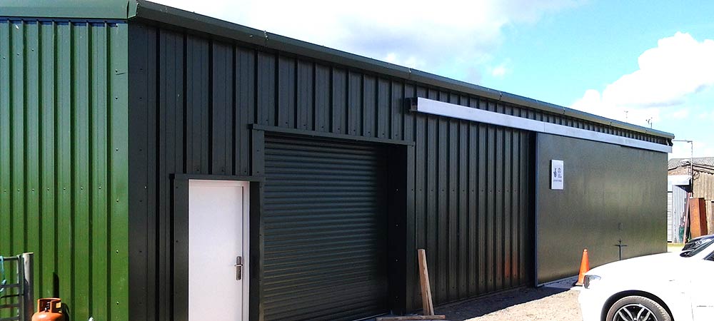 Steel frame buildings for garages and warehouses.