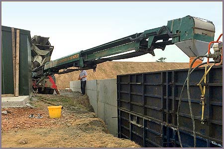 Mass concrete retaining walls.